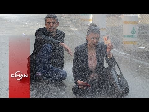 Elinde kimliği ile TOMA'ya karşı durdu