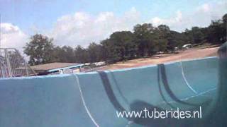 Tuberide Door De Glijbaan In Natuurbad De Schatberg