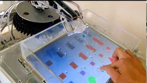 LiquiTouch - Liquid as a Medium for Versatile Tactile Feedback on Touch Surfaces