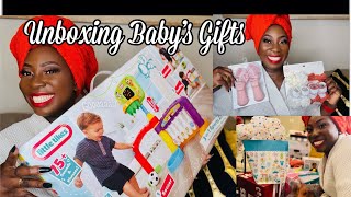 YOU WON'T BELIEVE WHAT WE GOT! OPENING OUR BABY SHOWER GIFTS! BABY SHOWER HAUL!