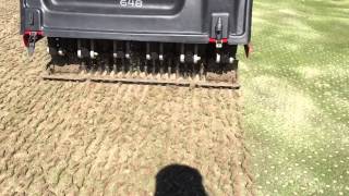 Golf course green aerification with Toro 648 Procore