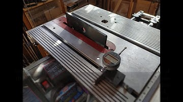 Aligning the Shopsmith table.