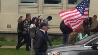 ANTIFA MARCHING TOWARDS TRUMP SUPPORTERS WITH SHIELDS/MASKS