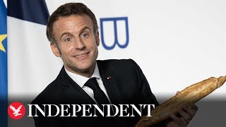 Macron presented with baguette as famous French bread granted global heritage status
