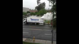 Shredding truck offering burn service