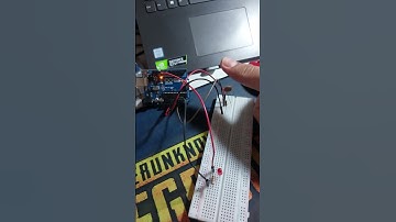 Circuit that lights an LED when it is sufficiently dark in a room:#coursera  #arduino #shorts