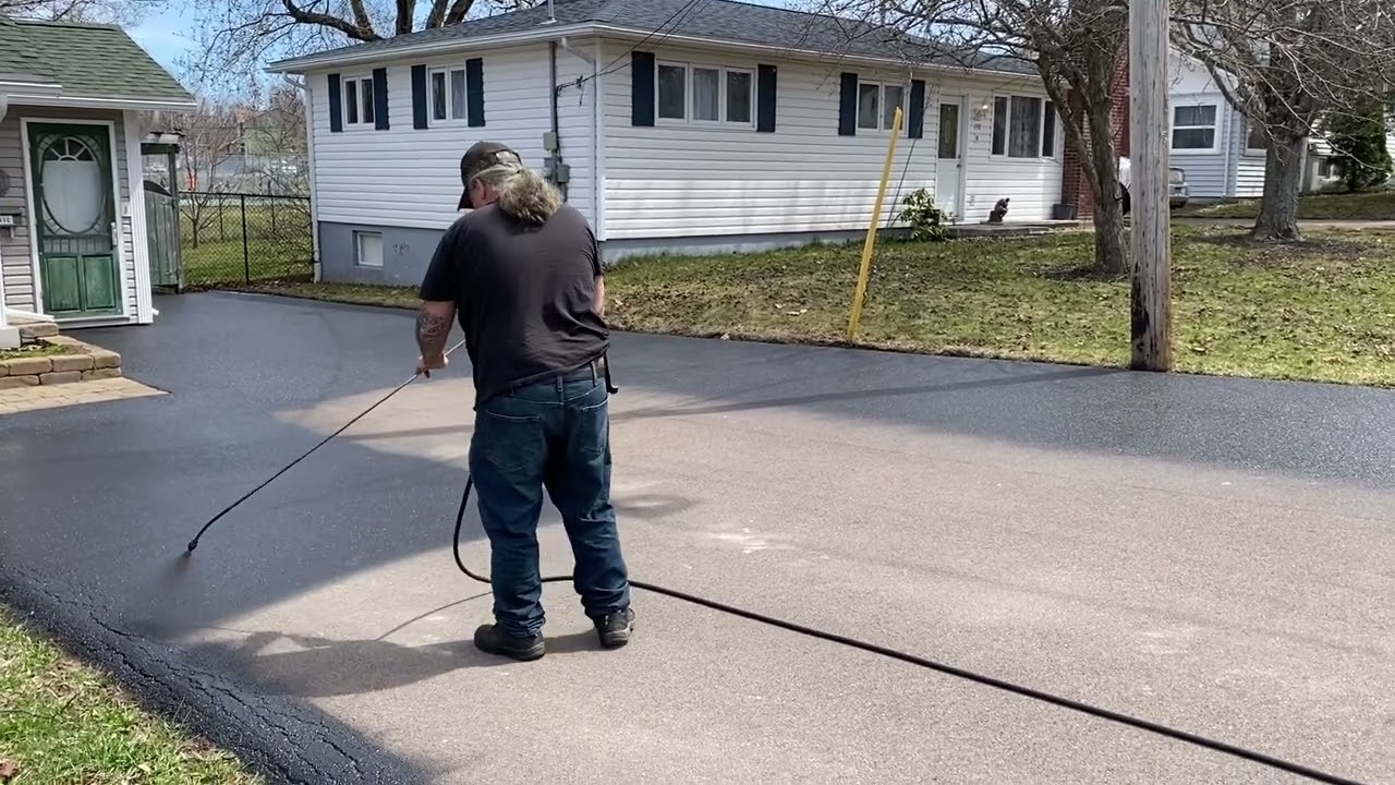 Professional Asphalt Spray Sealing: "The Curious Neighbor One" Top Coats Pavement Maintenance