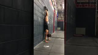 Handstand walk drill with side balancing