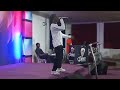 Prince Bk performance Rising up and Win Them at an event in Portharcourt.
