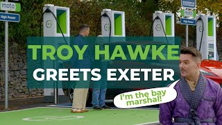 Troy Hawke Greeter's Guild at GRIDSERVE EV charging station in Moto Exeter