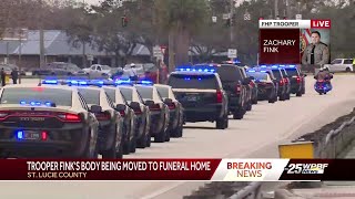 Trooper Fink's body being moved to funeral home