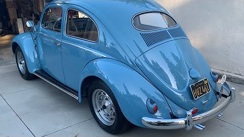 Riding around in a 1955 Oval Window VW Beetle