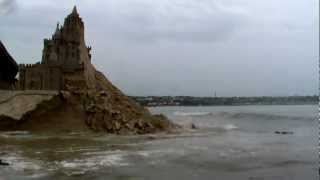 JERSEY CHANNEL ISLANDS highest tide demolishes largest sand castle in Britain