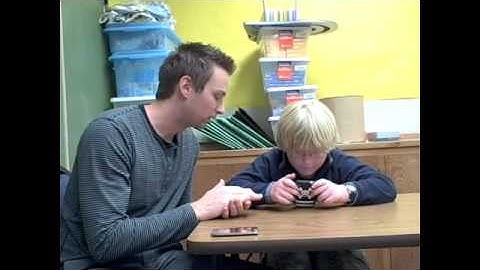 Student Demonstrating Proloquo2Go with Monkey Diving