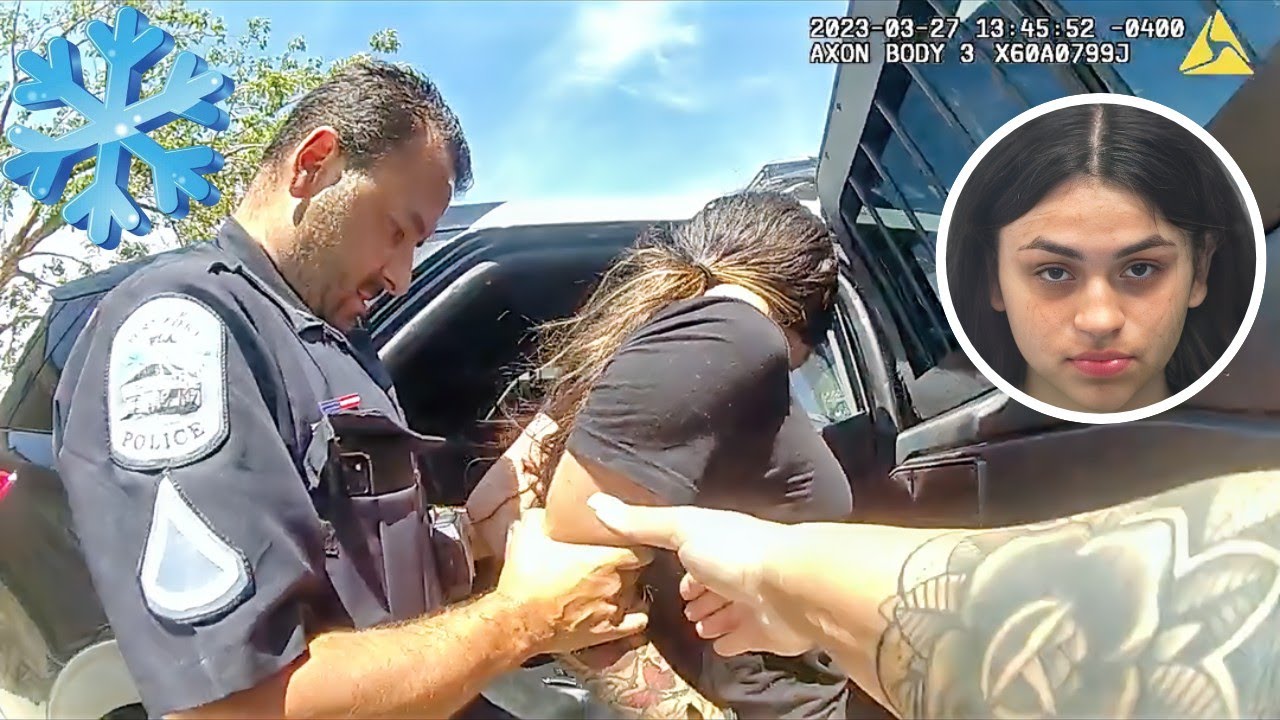 Teen Nearly Kicks Off Police Car Door Because It Was TOO HOT