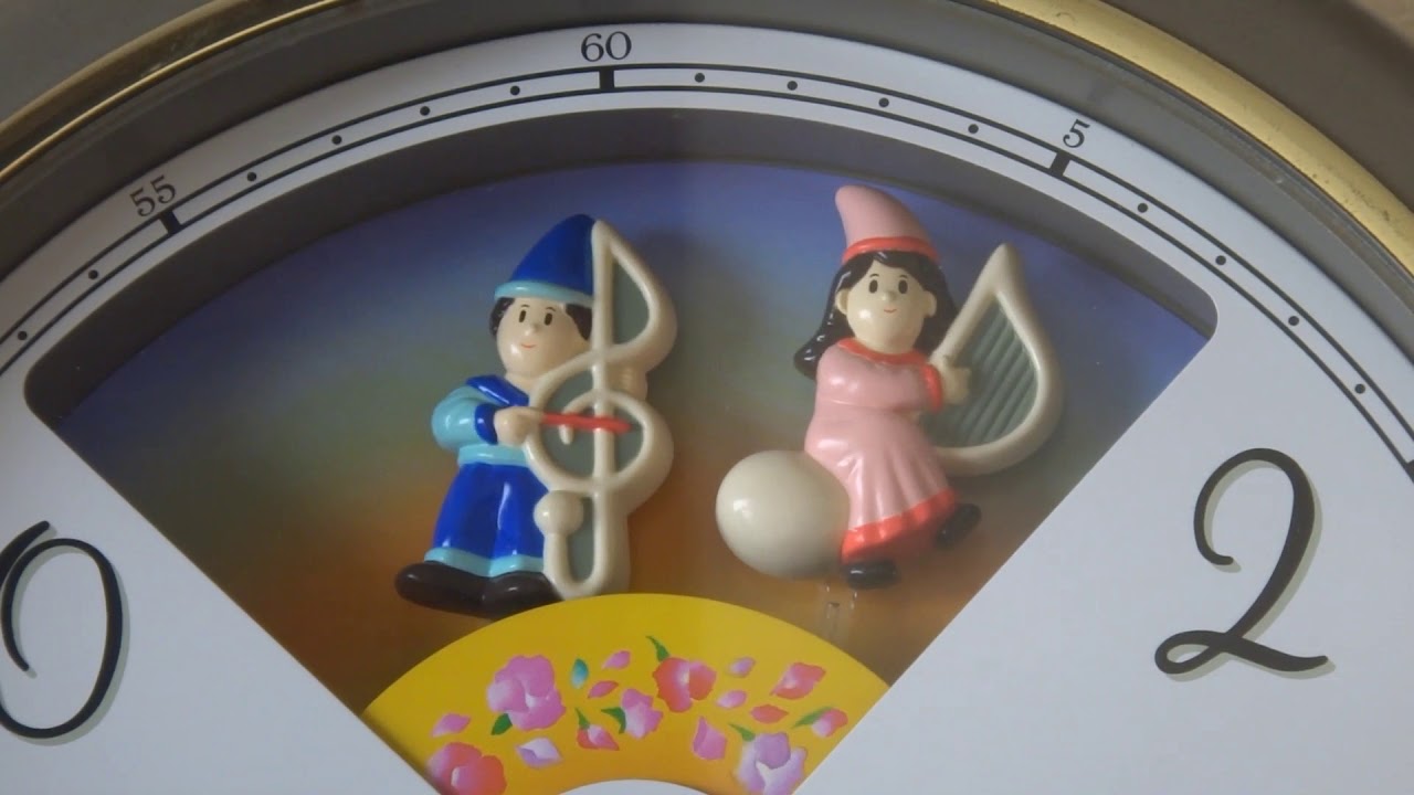 RHYTHM スモールワールド セレモニック からくり時計 - YouTube