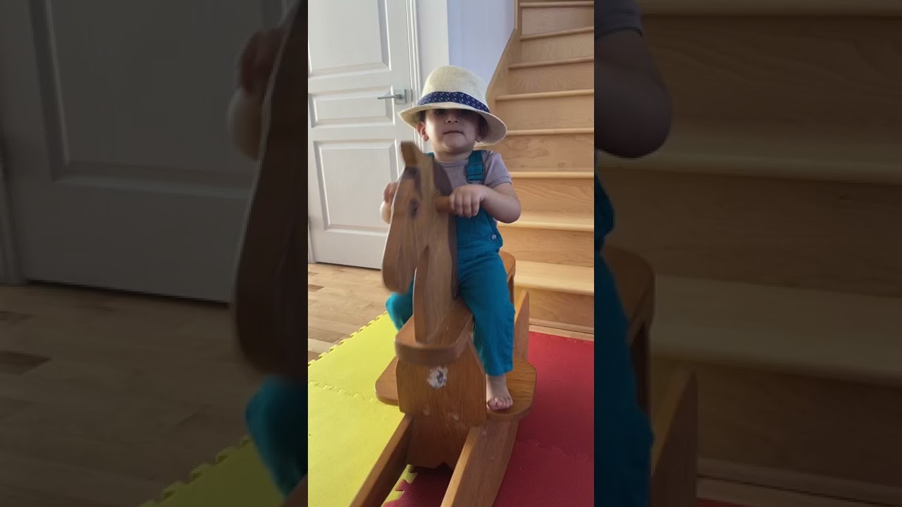 Cowboy Baby Rides His Rocking Horse 