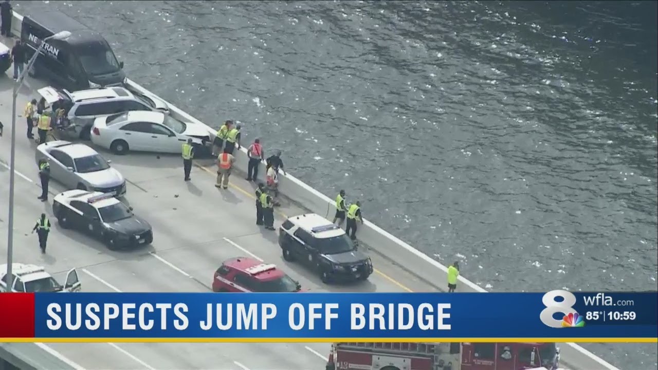 1 dead, 1 injured after suspects jump into Tampa Bay following crash on