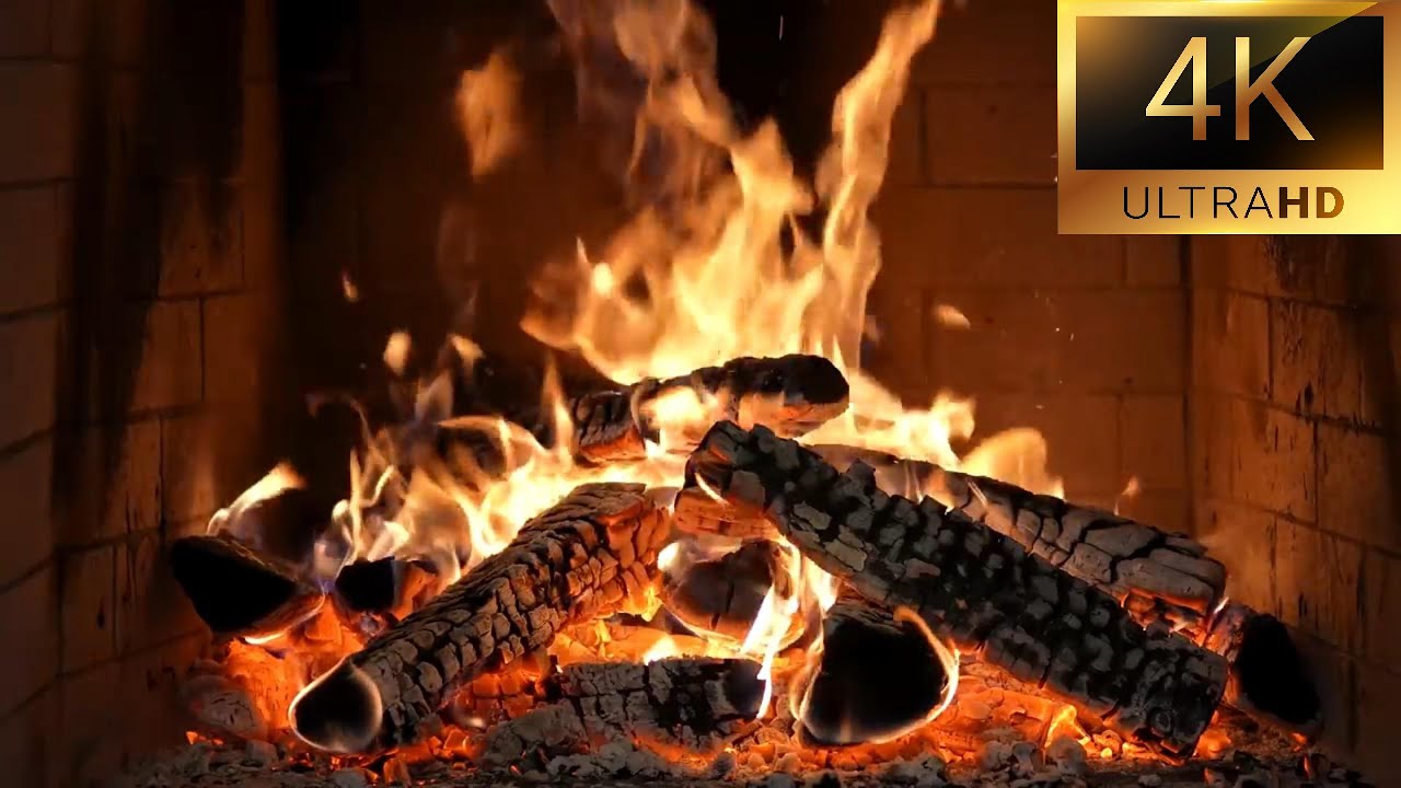 Relaxing Fireplace Ambience. Fireplace Burning video in 4K Ultra HD.