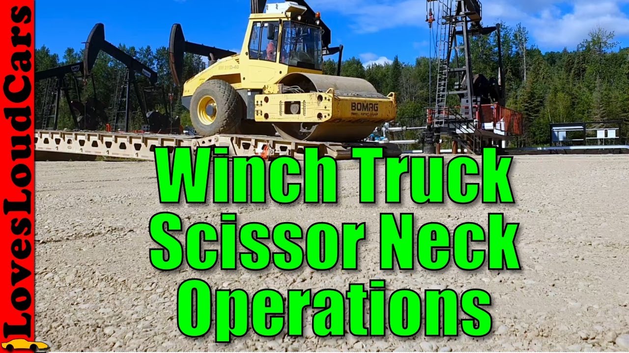 Loading a packer on a winch truck scissor neck trailer combo YouTube