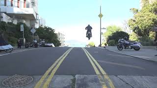Harley Jumps Road Gap in SF (Wheelie Pig)