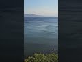 Шум моря и улицы  города Митимна на острове Лесбос. Греция. Вид сверху на игру ветра на воде.