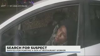 Officers looking for man accused of pointing gun at Panda Express employee in South City