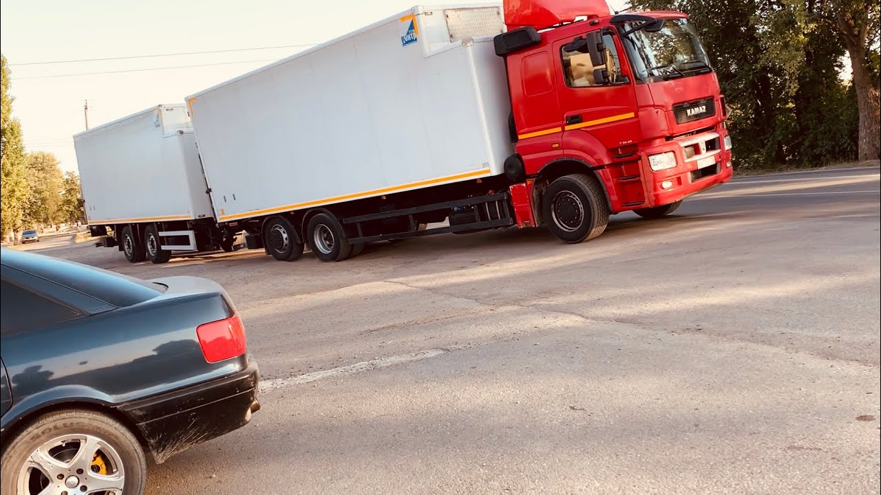 Камаз с ленивцем 65208