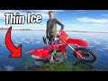 Dirt bike falls through ice sinks to bottom