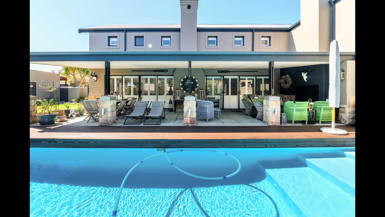 Immaculately presented Atlantic Beach Estate home - timeless elegance with top quality finishes.