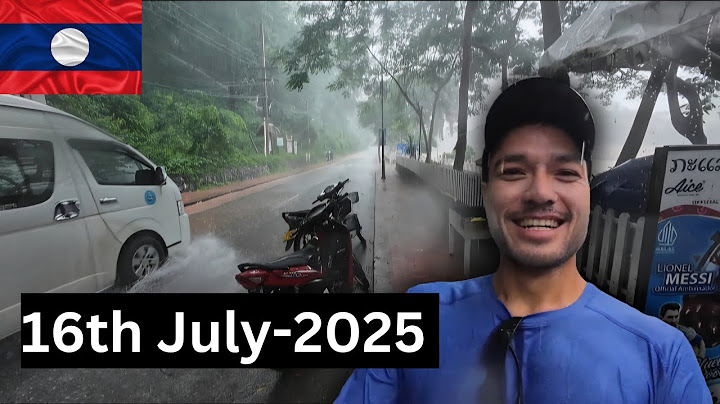 🇱🇦 Walking through the rain in Luang Prabang
