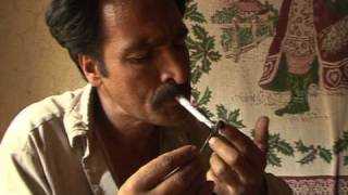Drop in Afghan opium crop, but poor still at risk