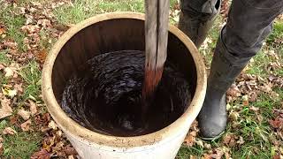Stirring BioDynamic preparations at the Temple Wilton Community Farm