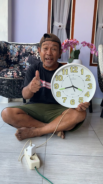 Jam dinding tanpa batrey