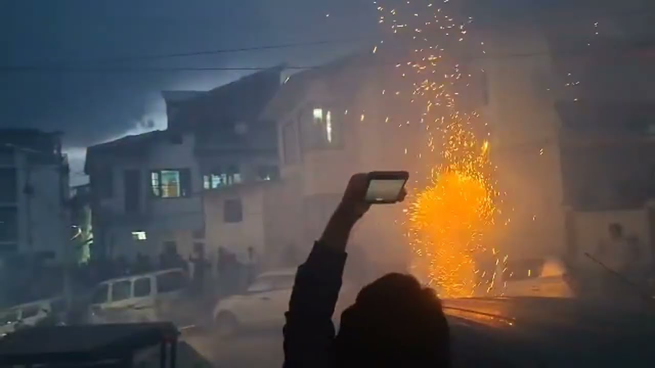 Celebration outside resident of MP Sajjad Kichloo at Kishtwar after winning Rajya Sabha elections