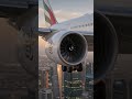 Emirates plane landing over city skyline. #Emirates #Aviation #Dubai #Boeing777