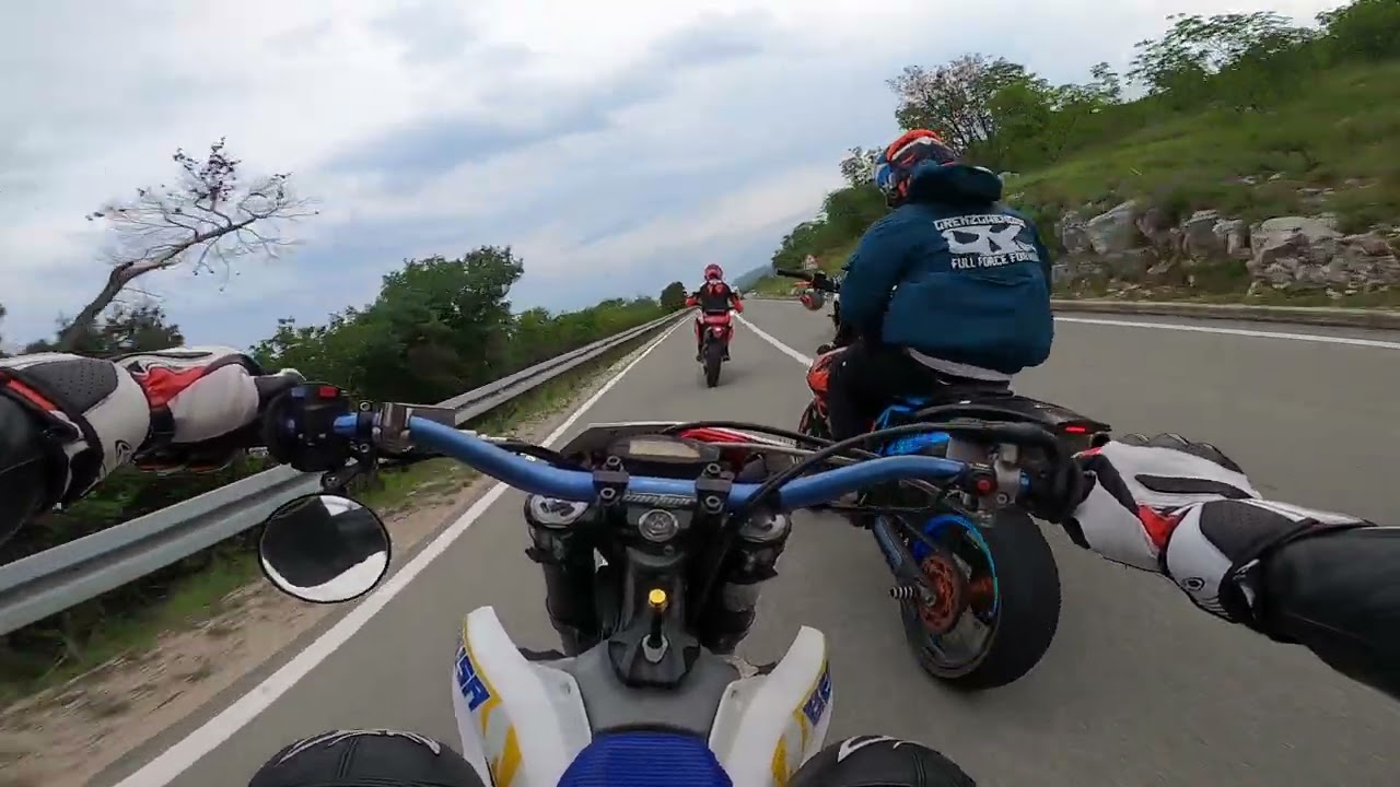 RAW Husaberg FS570 Supermoto chasing Sherco 125