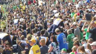 Connor doing push ups with the Notre Dame Marching band (score 14)