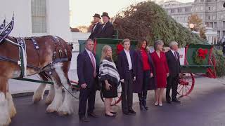 First Lady Melania Trump and Barron Trump Receive the White House Christmas Tree