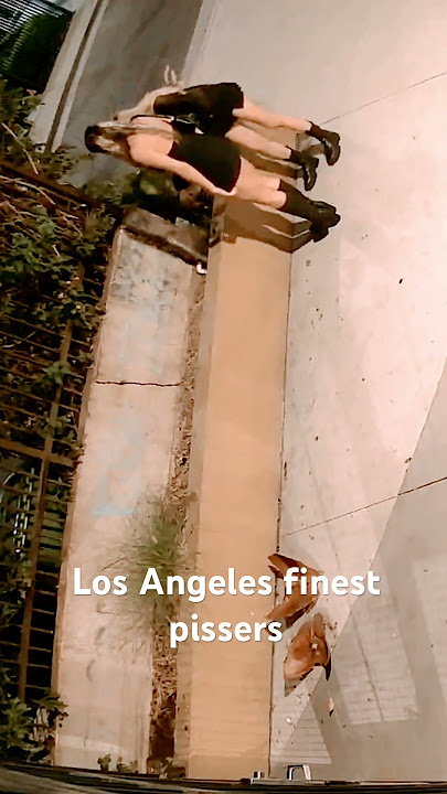 Los Angeles finest girls peeing into planter.