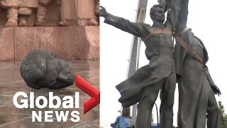 Heads roll as Soviet-era statue to Russian-Ukrainian 