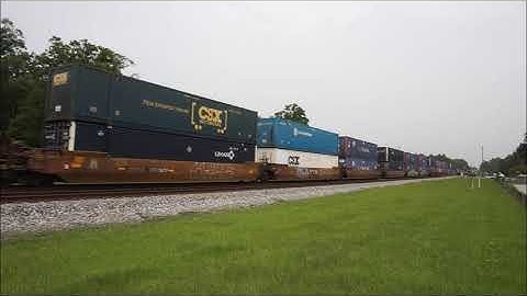 Big CSX intermodal train with dpu locomotive