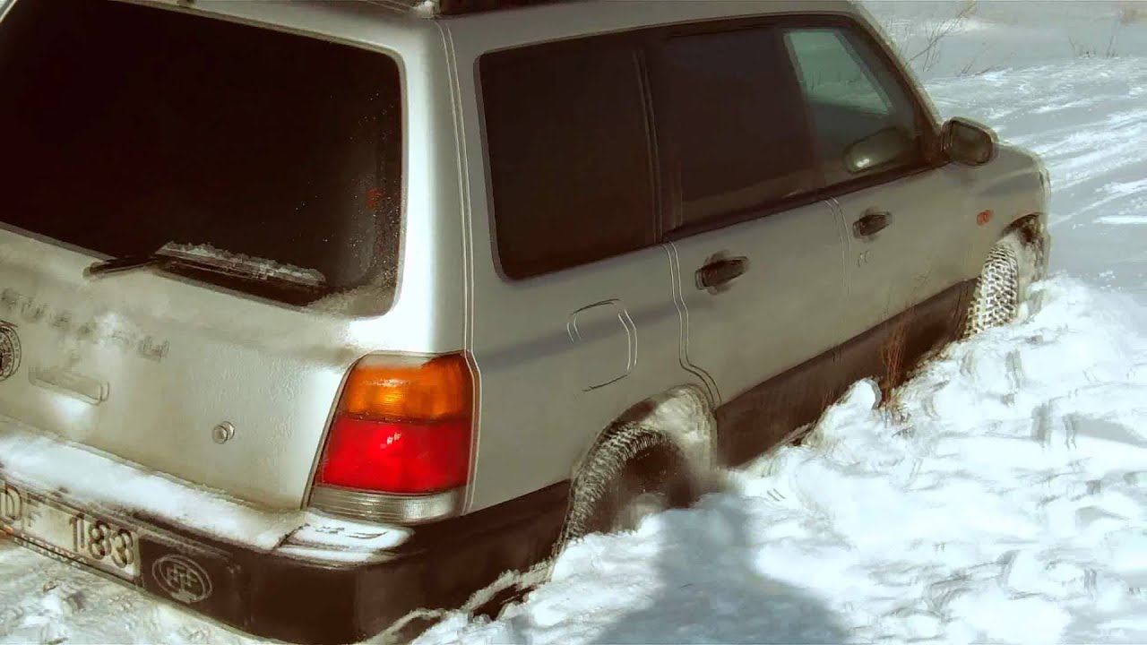 Lifted Subaru Forester stuck in The snow
