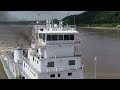 Big towboat mv viking queen pushing 42 barges northbound mississippi river