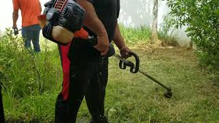 How to cut tall grass with a weedeater echo means business