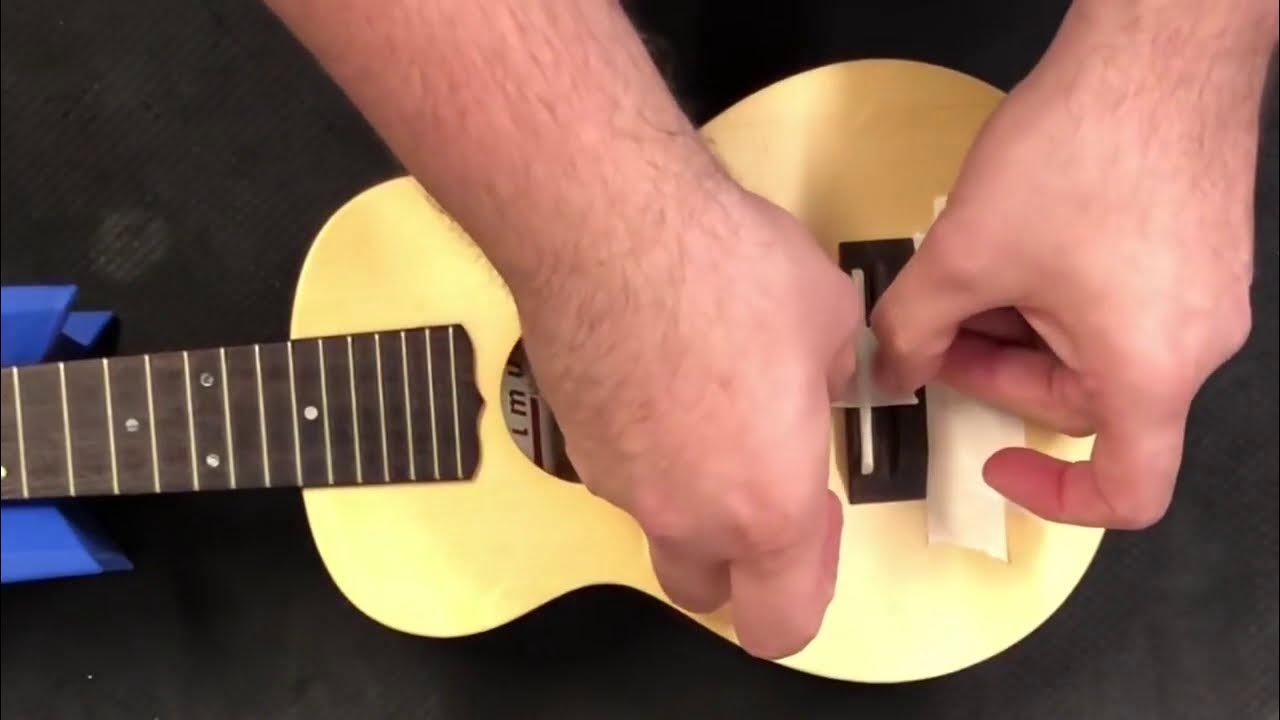 How to restring a tie on bridge ukulele YouTube