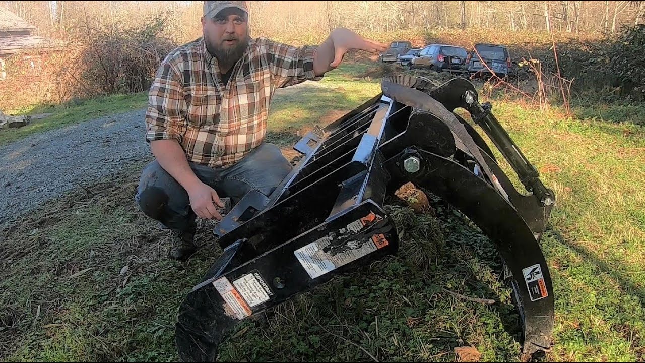 How to attach a grapple (or other skid steer attachment) to your tractor.