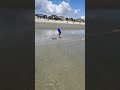 My little cousin skimboarding