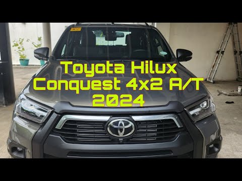 toyota hilux conquest 4x2 a/t 2024 oxide bronze metallic. - YouTube