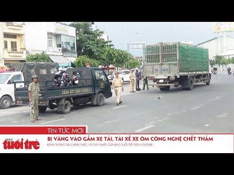 Video Bị văng vào gầm xe tải, tài xế xe ôm công nghệ chết... - youtube